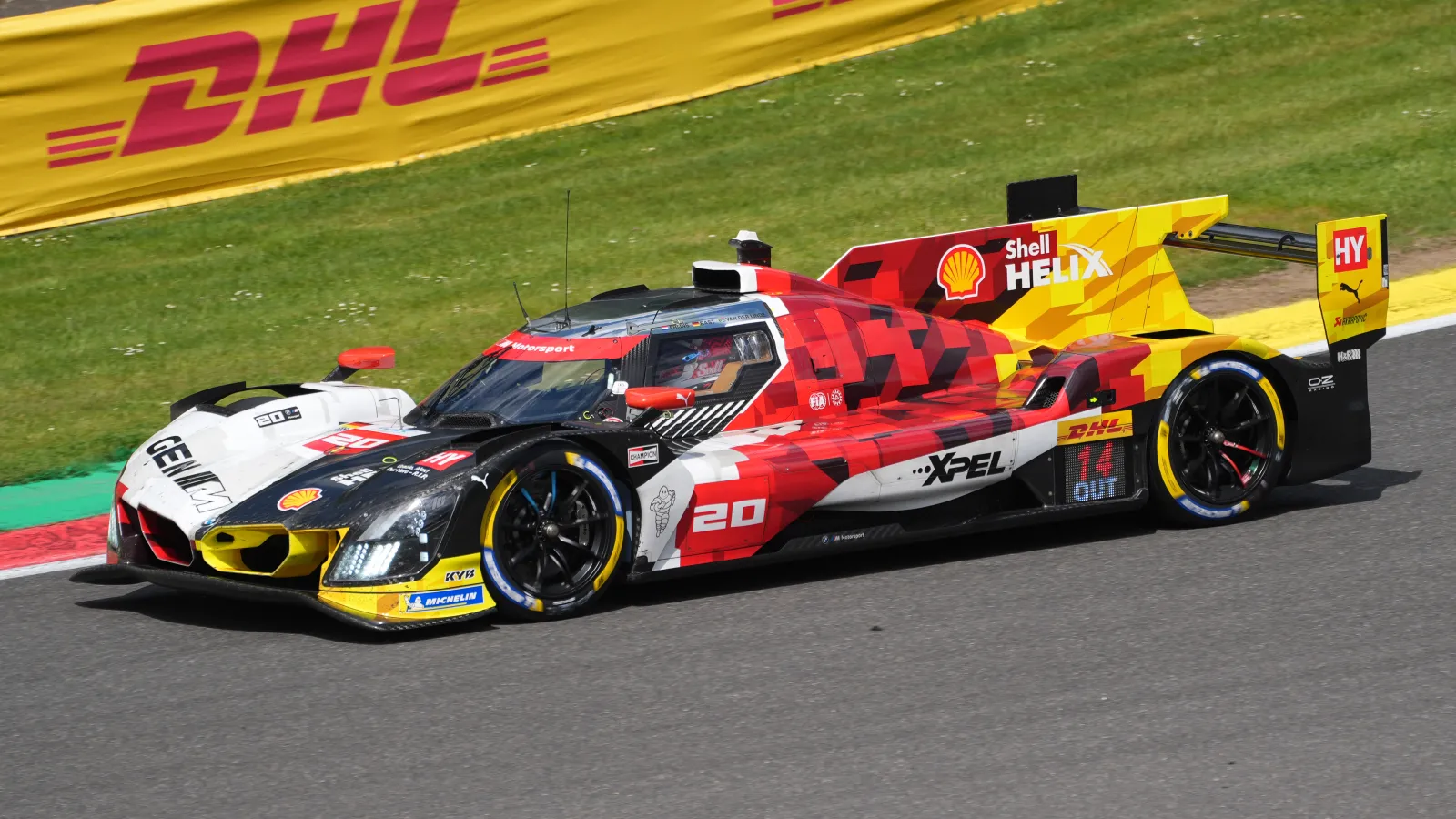 Number 20 BMW M Hybrid V8 in Shell colours cornering at Spa-Francorchamps