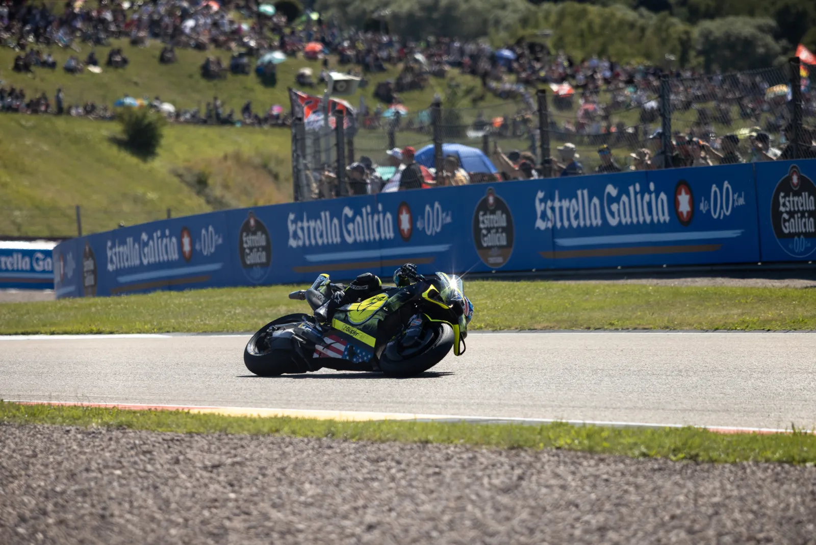 Ai Ogura leaning his Trackhouse Aprilia through a corner at the 2026 German Grand Prix