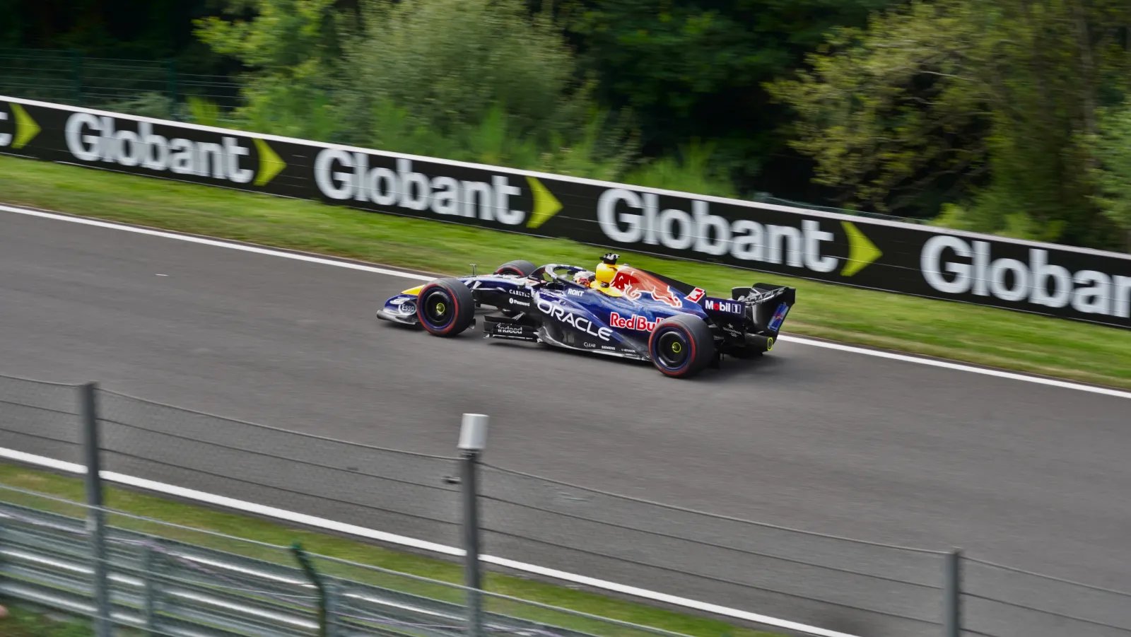 Max Verstappen's Red Bull RB22 at full speed on a Spa straight in 2026