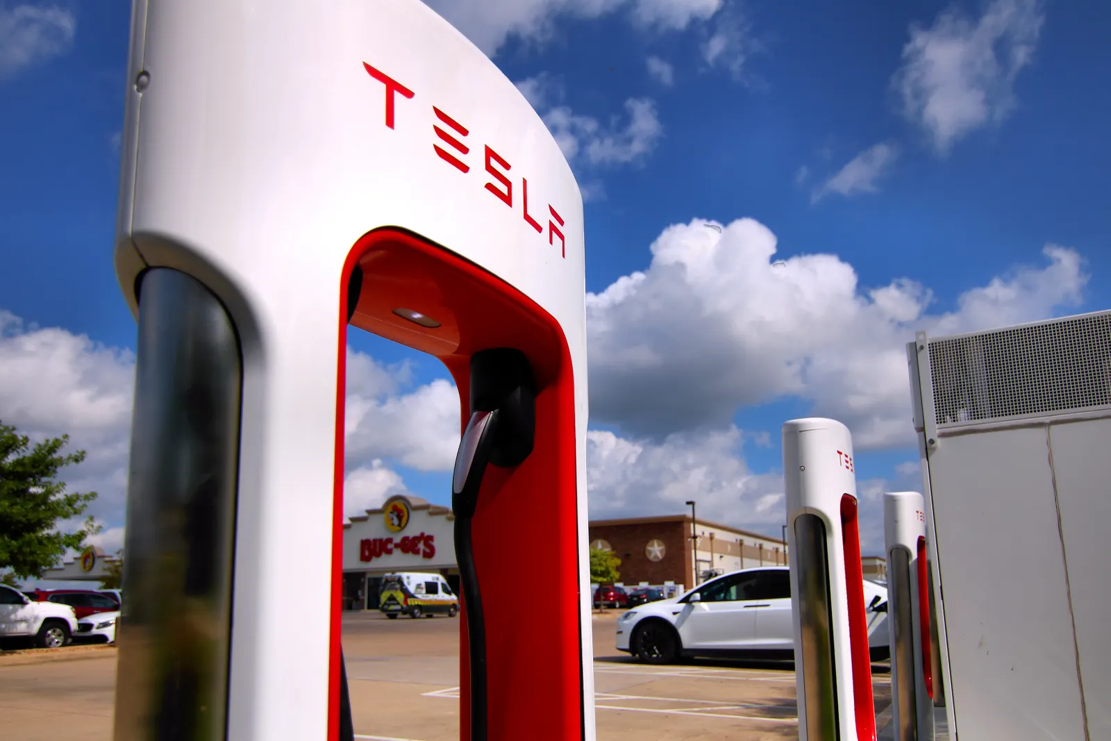 Which 2027 EVs have a native NACS port: Tesla Supercharger stalls in Bastrop, Texas